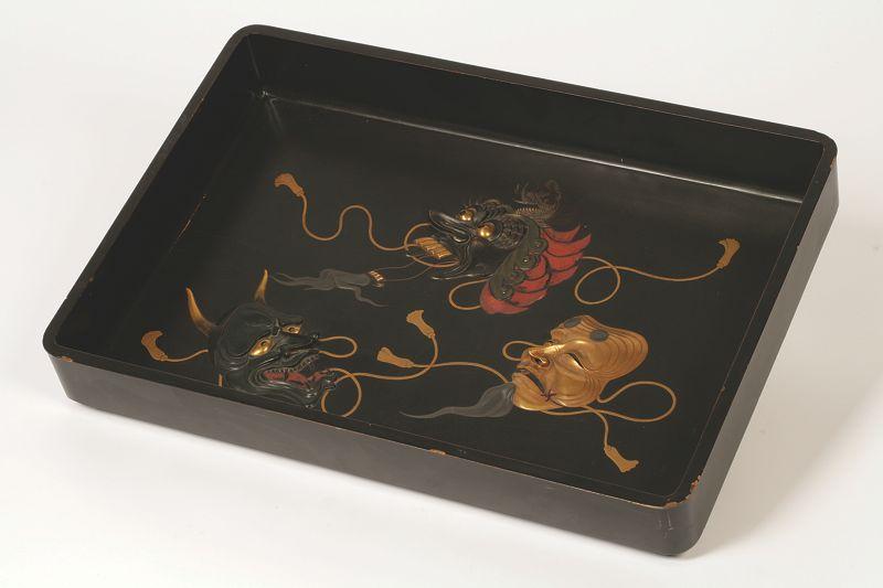 Appraisal: A JAPANESE LACQUER TRAY decorated in takabori with three noh