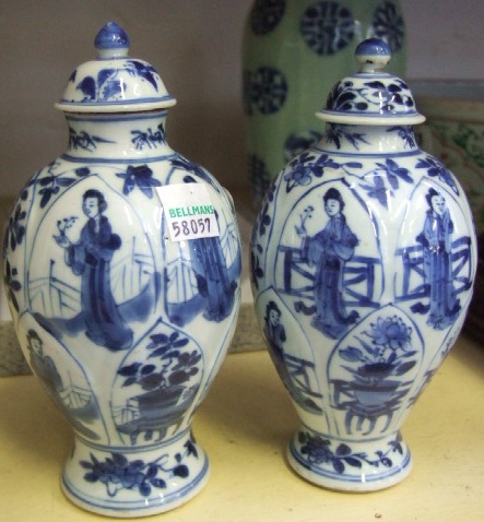 Appraisal: Two blue and white porcelain small vases and covers Qing