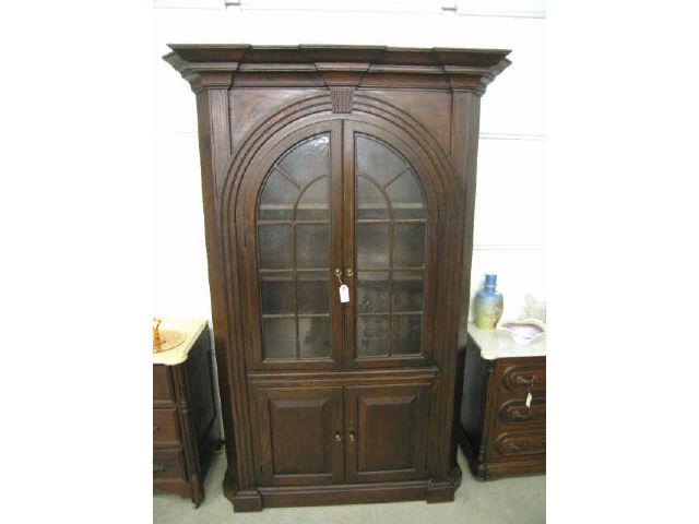 Appraisal: Antique Style Bookcase arch top double glass doors above solid