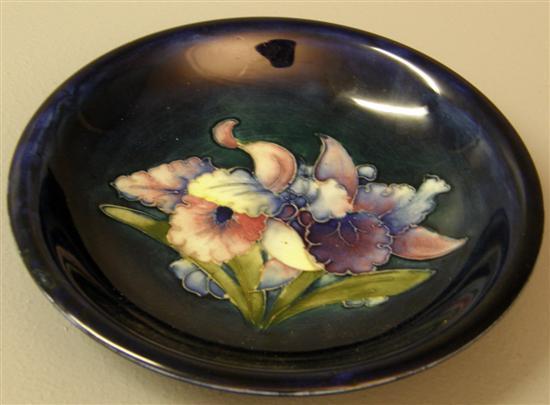 Appraisal: Moorcroft circular dish decorated with Irises on a deep blue