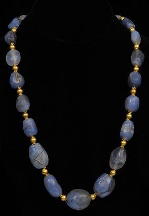 Appraisal: EARLY PERSIAN CHALCEDONY AND GOLD BEAD NECKLACE in Provenance Property