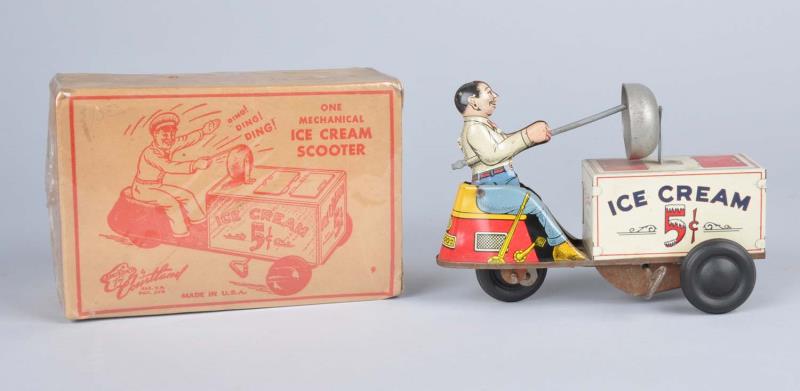 Appraisal: Cortland Tin Litho Wind-Up Ice Cream Scooter Toy Includes original