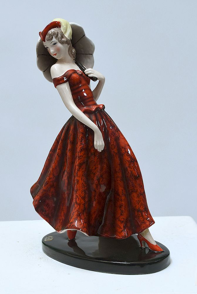 Appraisal: Goldscheider Art Deco figure of woman in patterned red dress