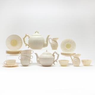 Appraisal: Belleek Two Partial Tea Sets the first with yellow sea