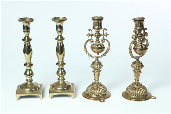 Appraisal: TWO PAIR OF BRASS CANDLESTICKS American or Continental th century