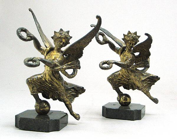 Appraisal: A pair of Continental gilt bronze figural mounts of Winged