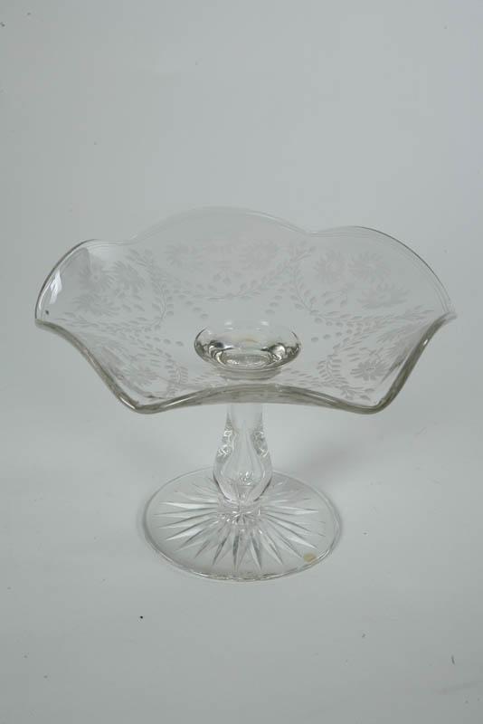 Appraisal: GLASS COMPOTE Intaglio cut glass compote with air trap stem