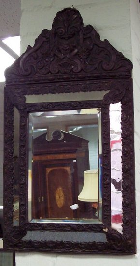 Appraisal: A Venetian type wall mirror with carved composition surround and