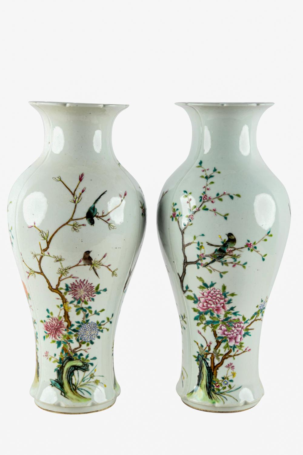 Appraisal: PAIR OF CHINESE POLYCHROME PORCELAIN VASESmarked to undersides decorated with