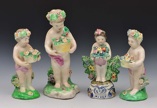 Appraisal: Four Derby model putti th Century largest cm