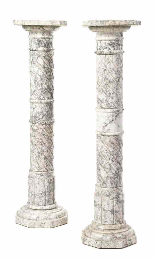 Appraisal: A Pair of Continental Marble Pedestals each having a squared