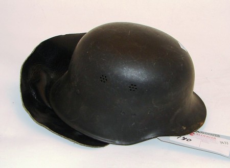 Appraisal: German black civil style Fire Police helmet with liner chin