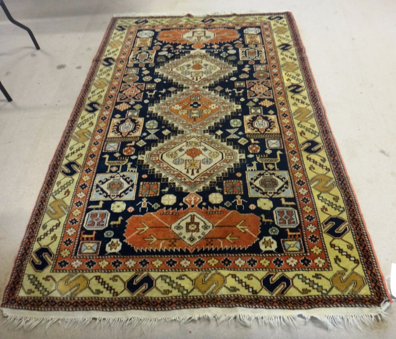 Appraisal: A Shirvan rug Caucasian the black field with three diamonds