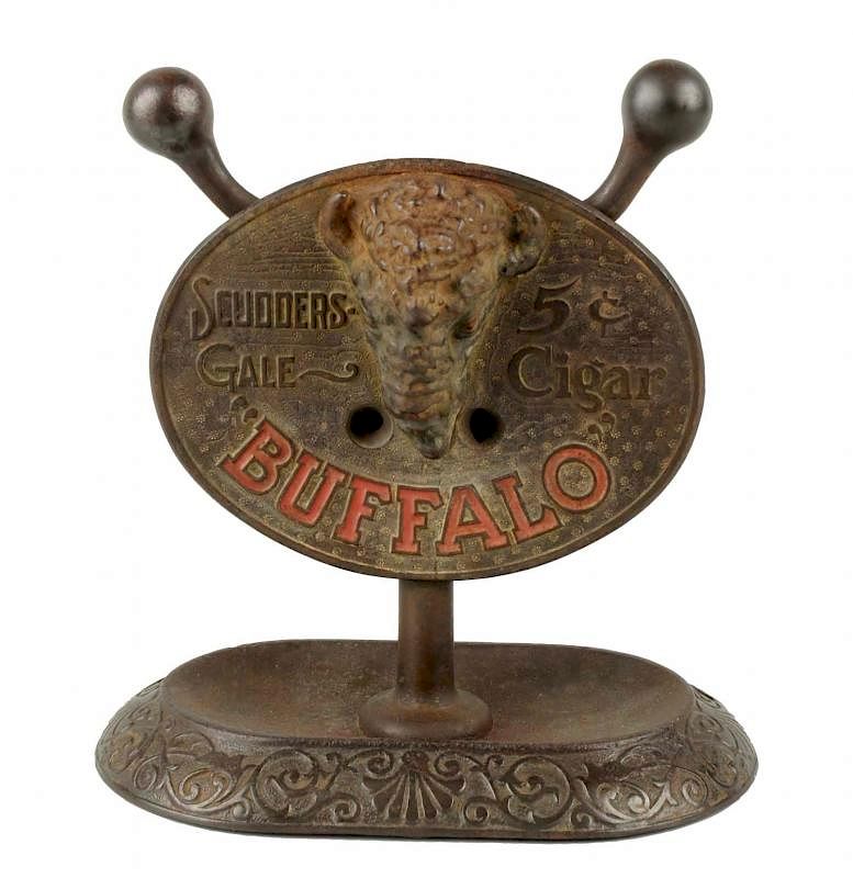 Appraisal: Brunhoff Buffalo Cigar Cutter The front plaque reads Scudders Gale