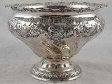 Appraisal: A silver rosebowl of swirl inverted pyriform shape with embossed