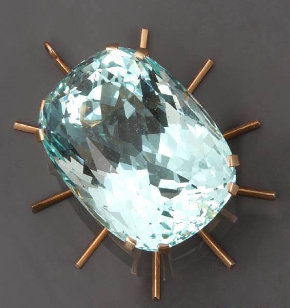 Appraisal: An aquamarine and k gold sunburst pendant aquamarine measuring x