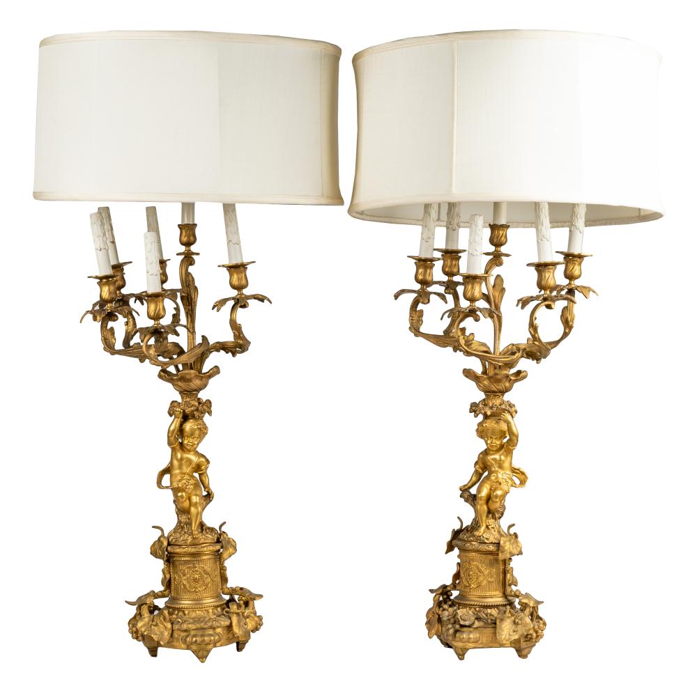 Appraisal: PAIR GILT BRONZE SIX-LIGHT FIGURAL CANDELABRAeach with twin sockets Condition