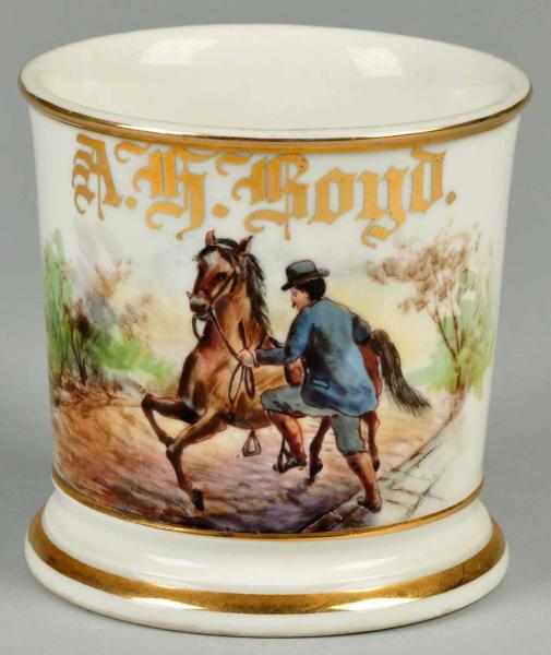 Appraisal: Man Getting on Riding Horse Shaving Mug Description Gilt name