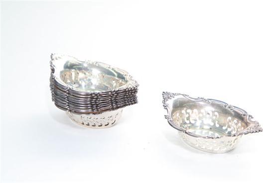 Appraisal: TWELVE GORHAM STERLING NUT DISHES Scalloped rims with scroll and