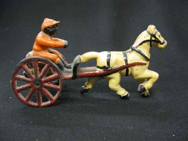 Appraisal: Antique Cast Iron Toy of Harness Horse black driver ''