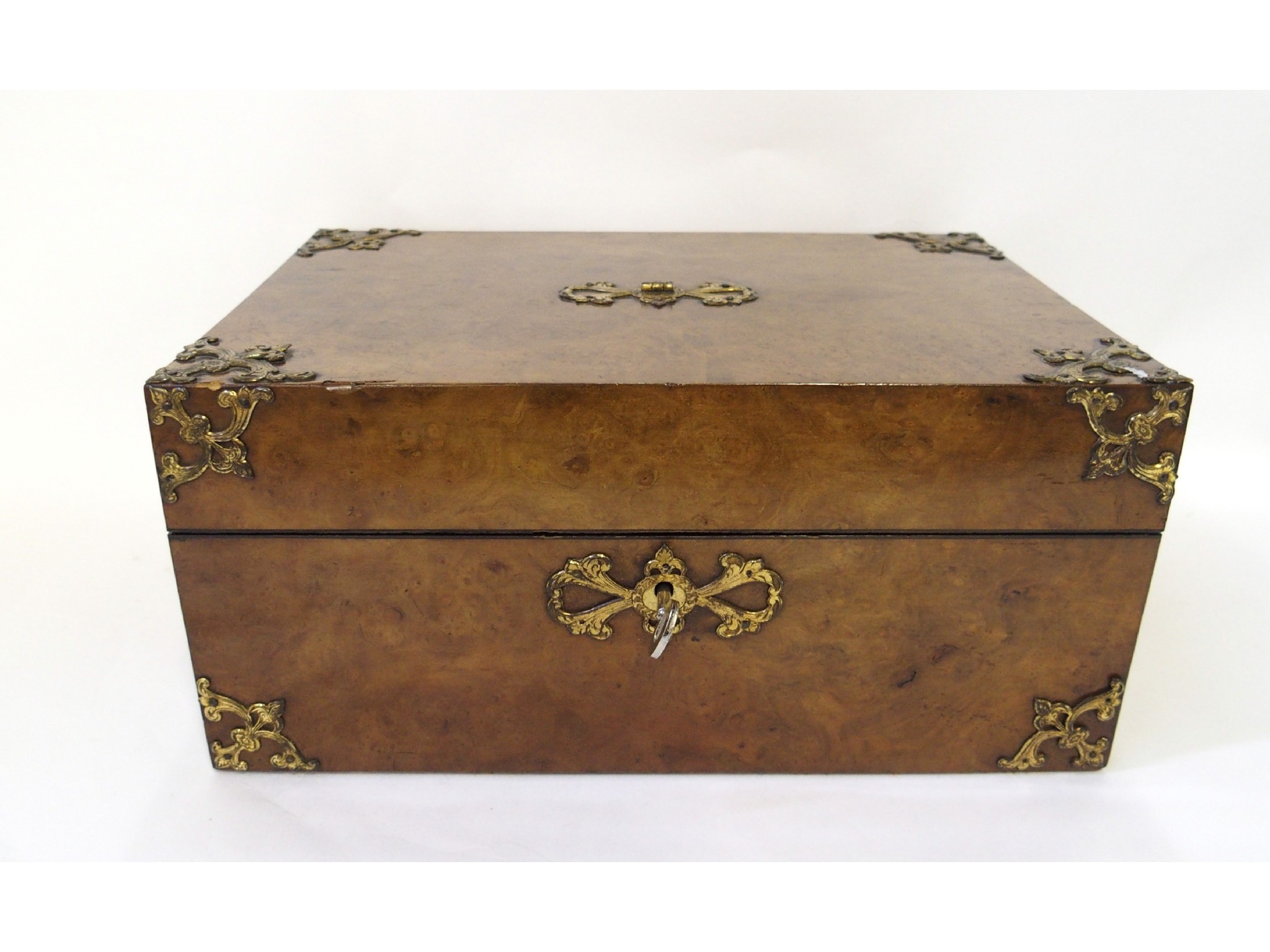 Appraisal: Burr walnut jewellery box with gilded metal mounts