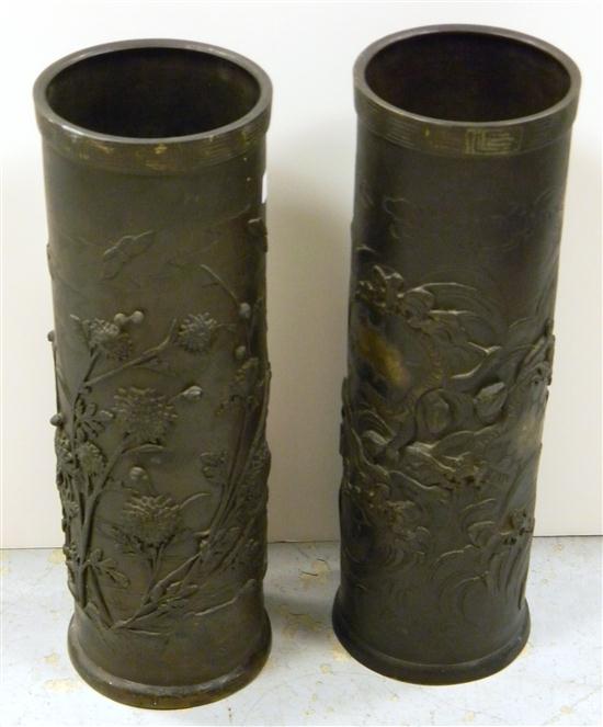 Appraisal: Two Asian brass cylindrical vessels one decorated with dragon motif