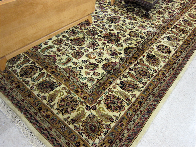 Appraisal: HAND KNOTTED ORIENTAL CARPET Indo-Persian having an overall floral decorated