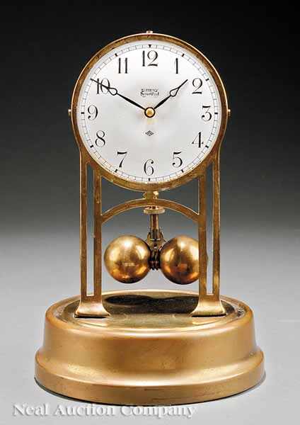 Appraisal: A Tiffany Neverwind Brass Mantel Clock c marked Tiffany Neverwind