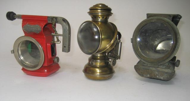 Appraisal: A Joseph Lucas Pathfinder oil fired lamp in red painted