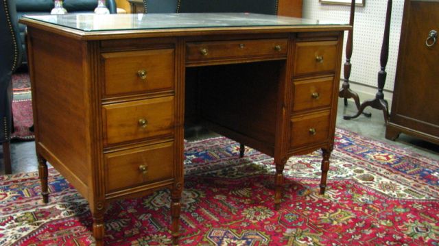 Appraisal: Vintage maple student desk seven drawers with fluted and carved