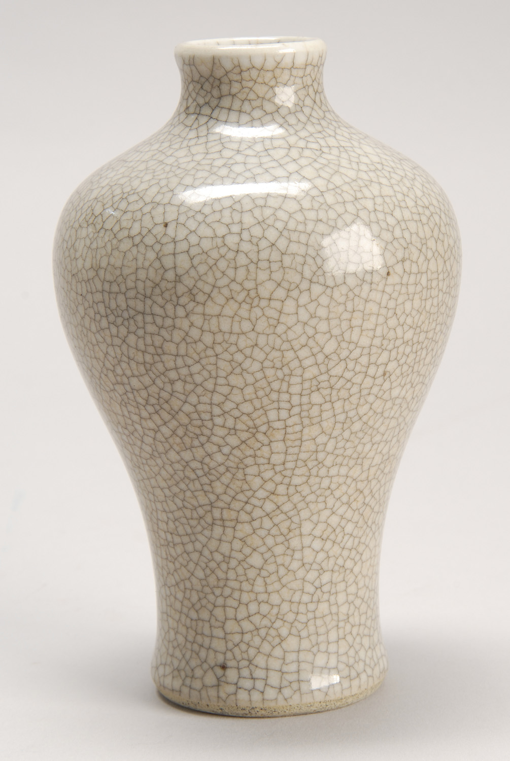 Appraisal: CRACKLEWARE PORCELAIN VASE In meiping form with delicate crackle glaze