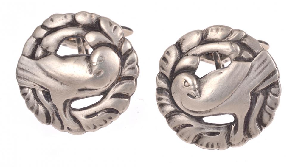 Appraisal: A PAIR OF CUFFLINKS BY GEORG JENSEN OF DOVE DESIGN