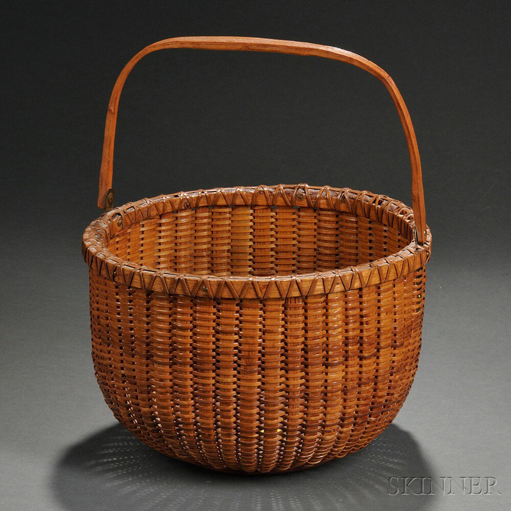 Appraisal: Nantucket Swing-handled Basket early th century the deep circular form