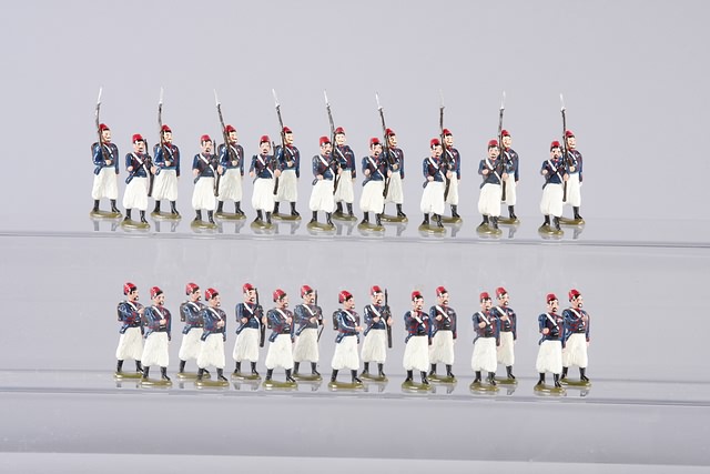 Appraisal: A similar lot of metal figures representing French Zouaves marching