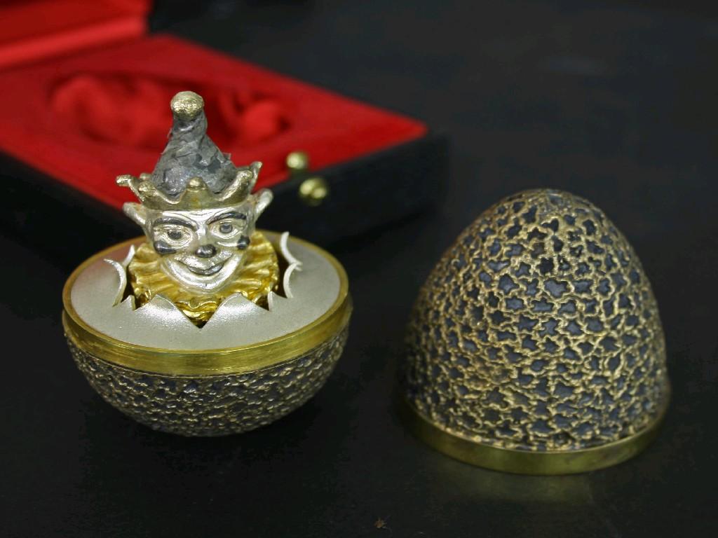 Appraisal: Stuart Devlin silver-gilt Easter egg limited edition the stylised relief