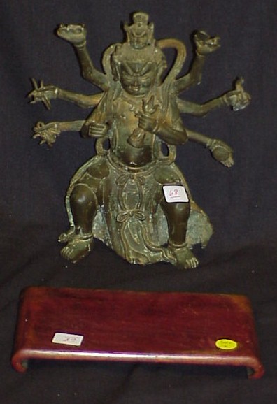 Appraisal: Bronze Buddhist figure probably Chinese th C figure has three