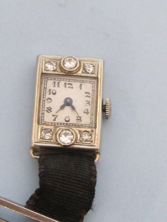 Appraisal: An Art Deco Lady's Lapel Fob Watch the square dial