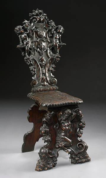 Appraisal: An Italian Baroque style carved walnut and pine side chair