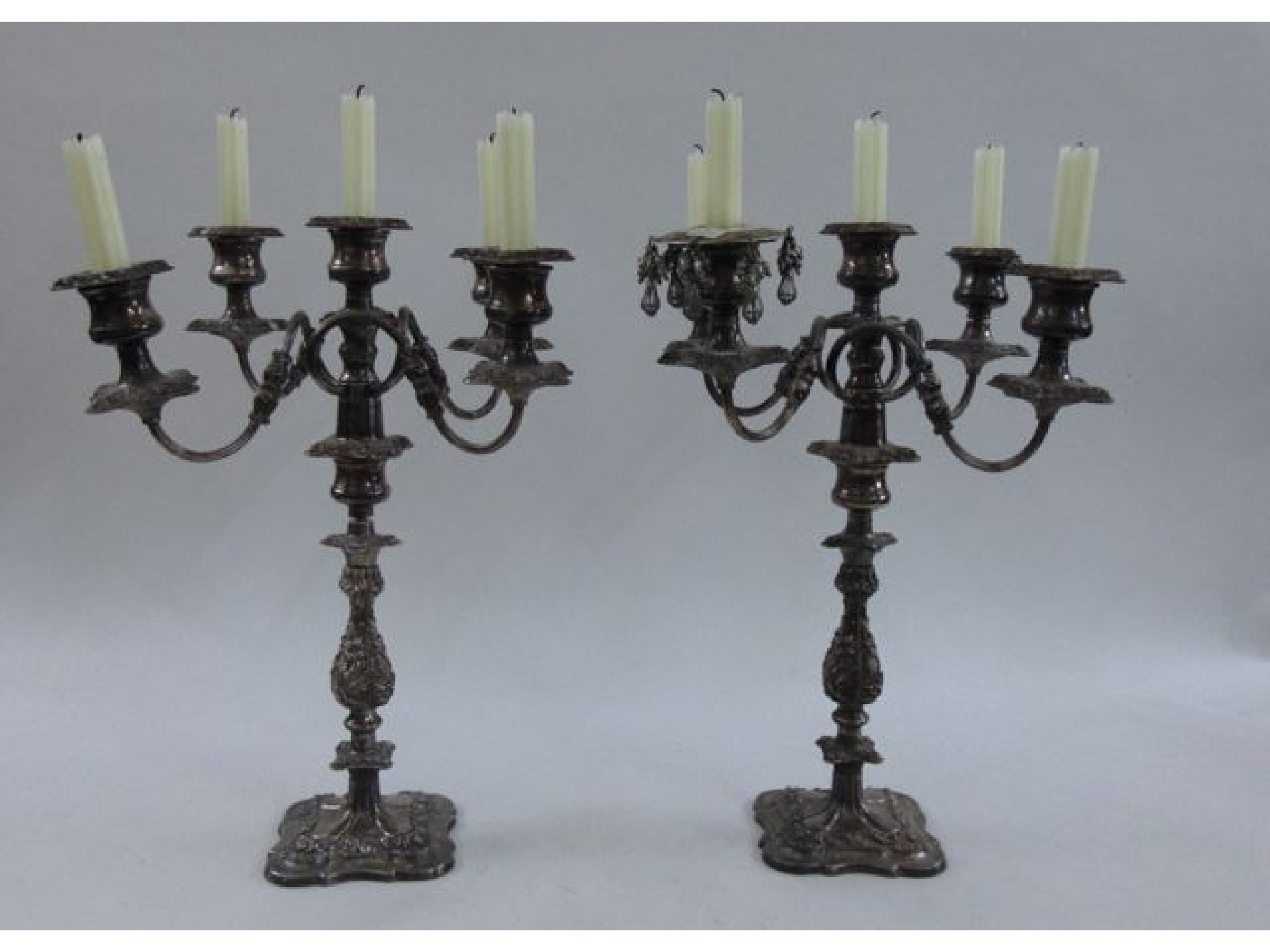 Appraisal: A pair of substantial four branch five light silver plated