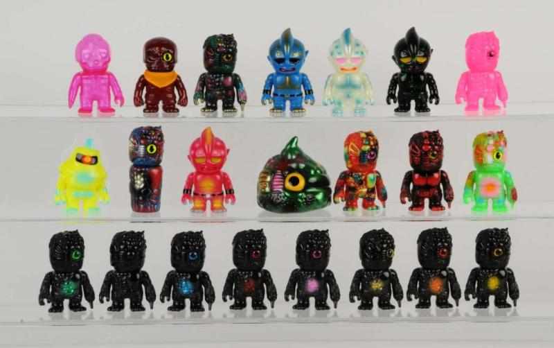 Appraisal: Lot of Real Head Mini Soft Vinyl Figures Description Includes