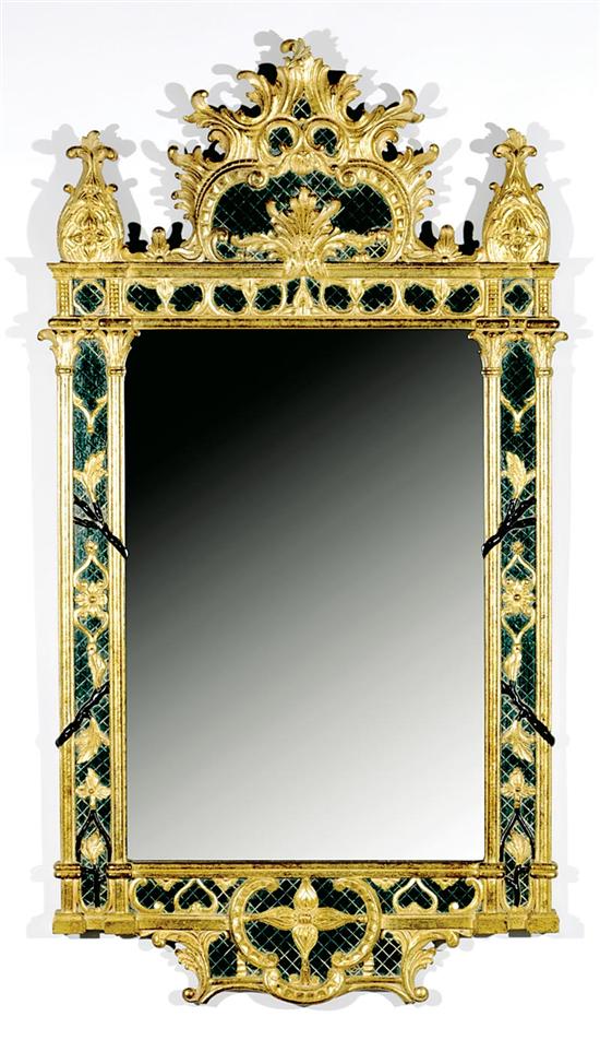 Appraisal: Carved giltwood and verdigris paneled mirror acanthus and C-scroll pediment