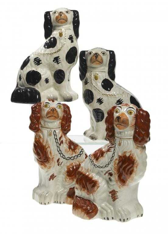 Appraisal: A PAIR OF STAFFORDSHIRE EARTHENWARE MODELS OF 'DISRAELI' SPANIELS AND