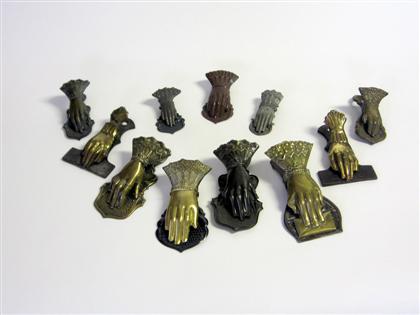 Appraisal: Eleven brass and tin hand-form paper holders some marked j