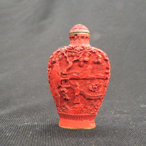 Appraisal: Chinese Carved Cinnabar Snuff Bottle signed scenes with villagers