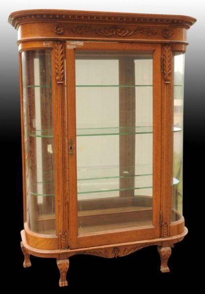 Appraisal: Oak Display Case with Curved Glass Sides Description Circa Includes