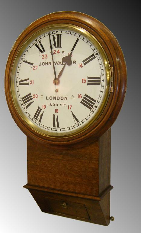 Appraisal: Oak single fusee drop dial Railway clock the white painted