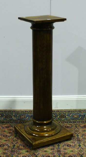 Appraisal: A stained oak pedestal modern cm high