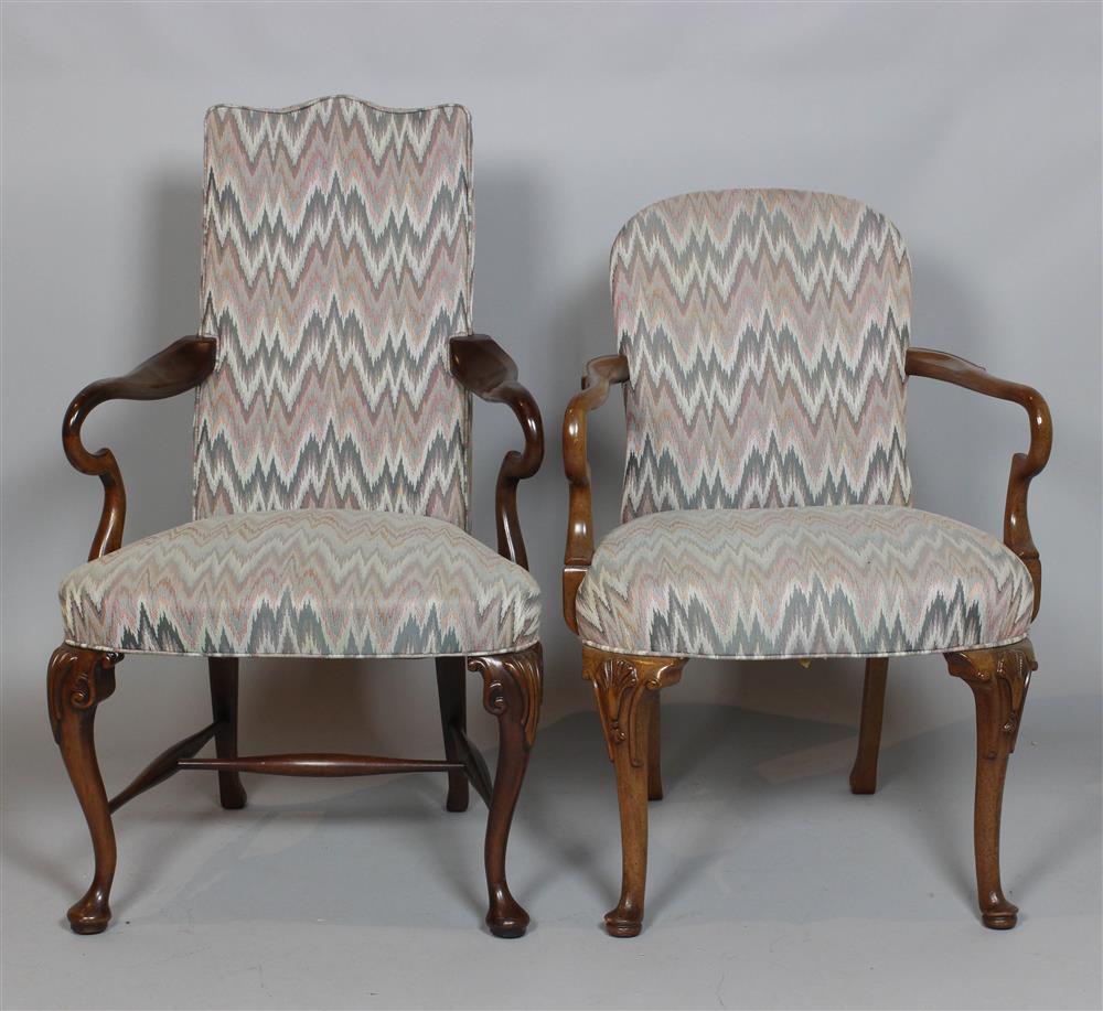 Appraisal: TWO QUEEN ANNE STYLE MAHOGANY LOLLING CHAIRS WITH MATCHING FLAME