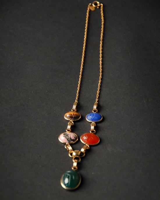 Appraisal: A Gold and Semi-precious Stone Scarab Necklace K marked yellow