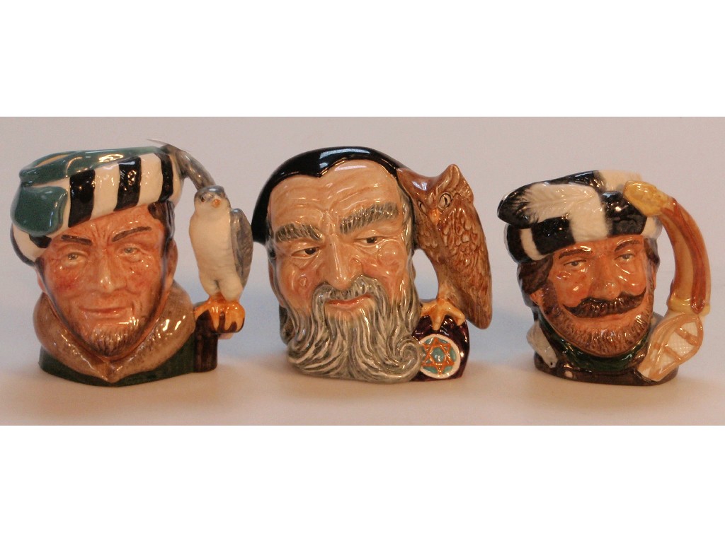 Appraisal: Three small Royal Doulton character jugs The Trapper D Merlin